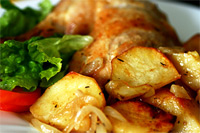 Pollo al horno con papas y boniatos